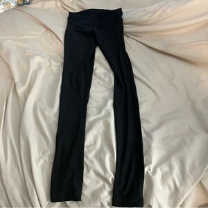 Under armour women’s size XS black workout leggings 
Made of nylon and elastane